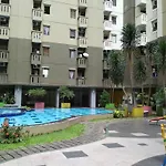 Homey 2Br At Gateway Ahmad Yani Cicadas Apartment By Travelio